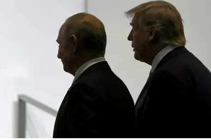 Дональд Трамп і володимир путін. Фото АР