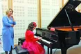 «У трирічному віці вперше почула, як звучить піаніно і як цікаво по ньому «проходити» пальцями...»