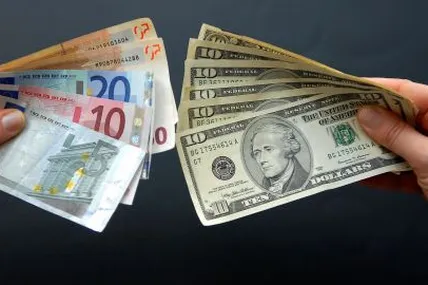 Офіційний курс долара зріс до 41,31 грн, євро — до 48,27 грн. Фото: РБК