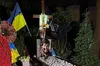Поліція затримала жінку за наругу над могилами військових в Києві