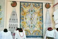 На килимах оживають квіти та птахи