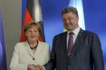 Порошенко розповів Меркель про порушення перемир’я на сході України
