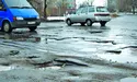Скільки коштують водіям ями на дорогах?