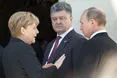 Порошенко і Путін неформально поспілкувалися у Нормандії