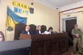 «Особа в чорній кепці підіймає обличчя на долю секунди, і це не Зінченко…»