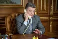 Порошенко при Меркель закликав Путіна припинити вогонь