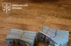 Масштабна спецоперація в Нацполіції: у посадовців вилучили елітні авто, зброю та понад 22 млн грн