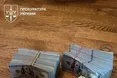Масштабна спецоперація в Нацполіції: у посадовців вилучили елітні авто, зброю та понад 22 млн грн