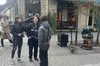 Вуличні фотографи розважаються в центрі Львова під російські пісні?
