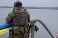 Над Антонівським мостом ЗСУ підняли український прапор