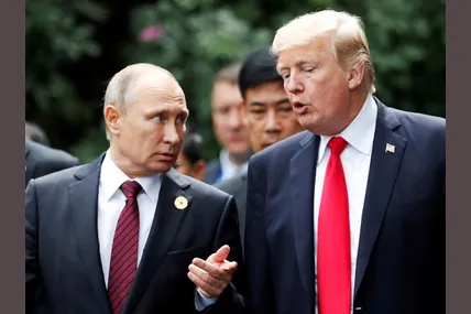 Дональд Трамп і володимир путін. Фото із сайту Reuters